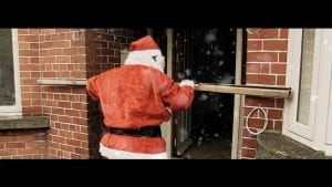 Picture of santa trying to deliver a new wood floor